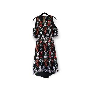 BRAND NEW! NEVER WORN! Gorgeous Women’s hand sewn flowery dress with cutout back
